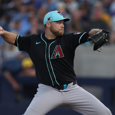 Corbin Burnes of the Arizona Diamondbacks pitches in the first inning during the spring training game against the Milwaukee Brewers at American Family Field of Phoenix.