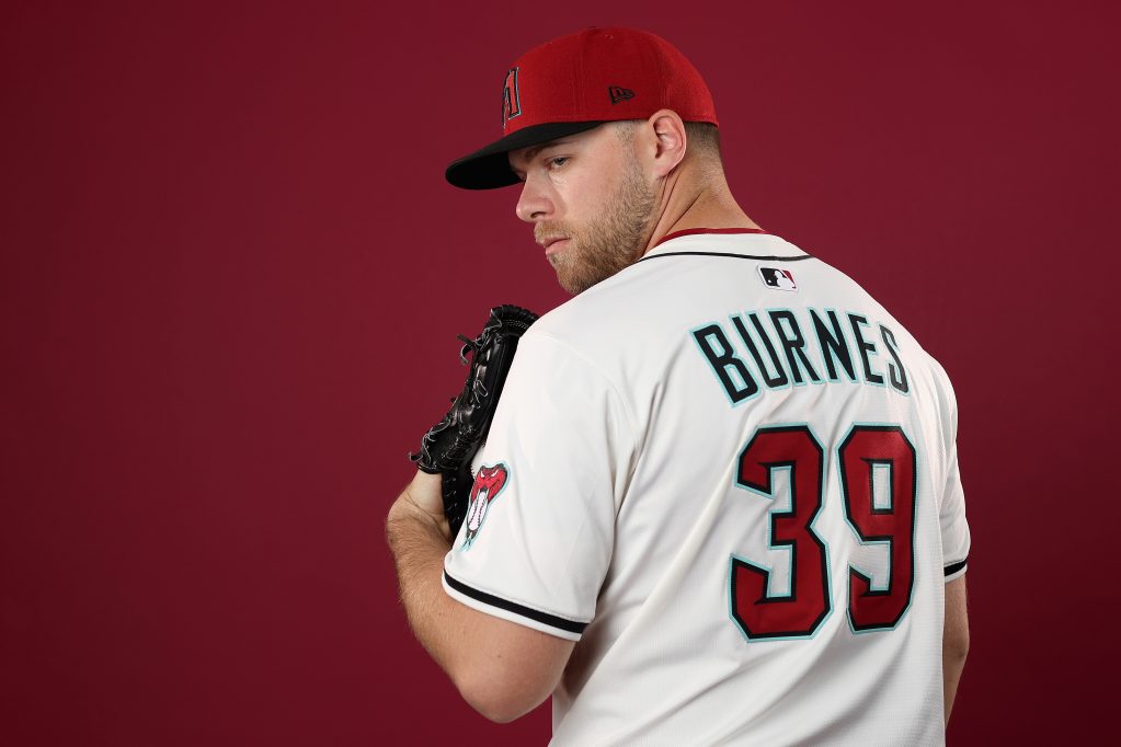 SCOTTSDALE, ARIZONA - FEBRUARY 19: Corbin Burnes #39 of the Arizona Diamondbacks poses for a portrait during photo day at Salt River Fields at Talking Stick on February 19, 2025 in Scottsdale, Arizona.  (Photo by Christian Petersen/Getty Images)