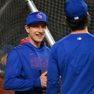 PHOENIX, ARIZONA - MARCH 28: Manager Craig Counsell #11 of the Chicago Cubs talks with Dansby Swanson #7 prior to a game against the Arizona Diamondbacks at Chase Field on March 28, 2025 in Phoenix, Arizona. (Photo by Norm Hall/Getty Images)