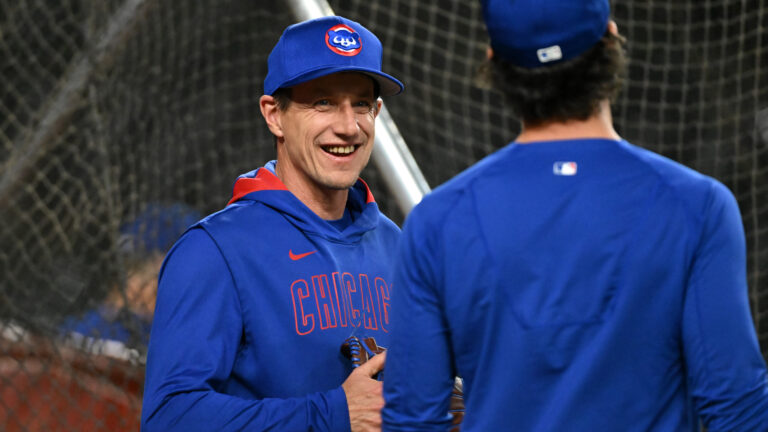 PHOENIX, ARIZONA - MARCH 28: Manager Craig Counsell #11 of the Chicago Cubs talks with Dansby Swanson #7 prior to a game against the Arizona Diamondbacks at Chase Field on March 28, 2025 in Phoenix, Arizona. (Photo by Norm Hall/Getty Images)