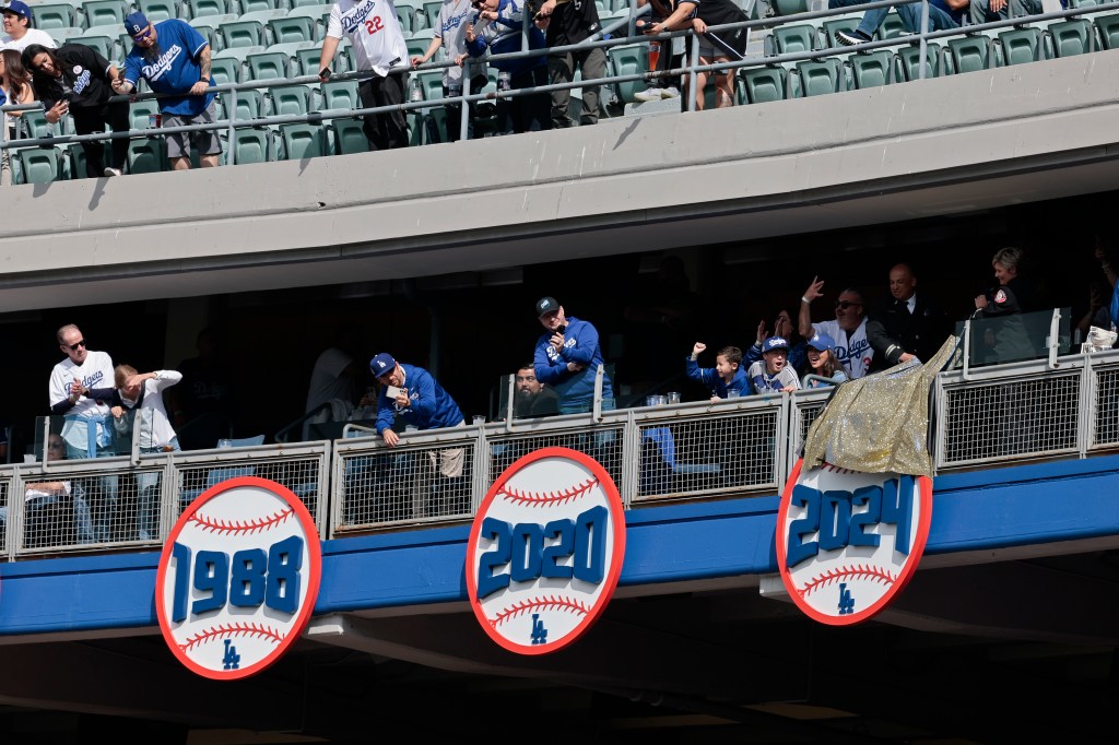 A general view is seen of the unveiling of the 2024 World Series Banner before the game between the Los Angeles Dodgers and the Detroit Tigers on Opening Day at Dodger Stadium.