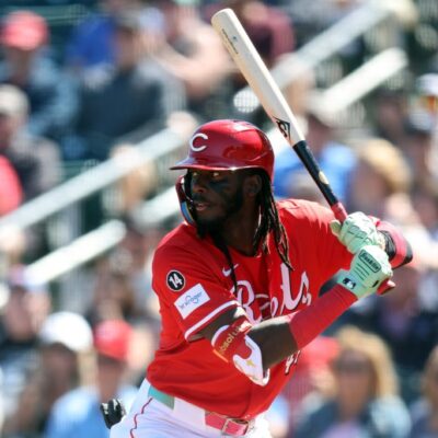 Elly De La Cruz of the Cincinnati Reds bats during a spring training game.