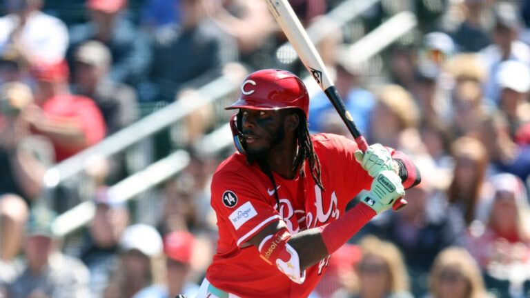 Elly De La Cruz of the Cincinnati Reds bats during a spring training game.