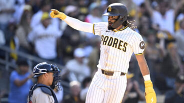 Fernando Tatis Jr. of the San Diego Padres celebrates after scoring a run against the Atlanta Braves during the seventh inning on Opening Day at Petco Park.