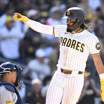 Fernando Tatis Jr. of the San Diego Padres celebrates after scoring a run against the Atlanta Braves during the seventh inning on Opening Day at Petco Park.