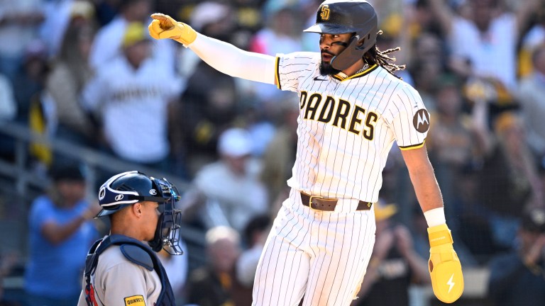 Fernando Tatis Jr. of the San Diego Padres celebrates after scoring a run against the Atlanta Braves during the seventh inning on Opening Day at Petco Park.