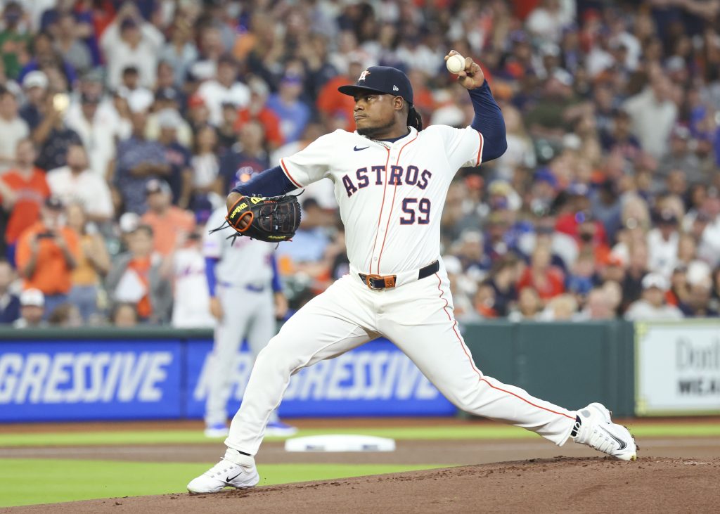 HOUSTON, TX - MARCH 27: Houston Astros starting pitcher Framber Valdez (59) throws a pitch in the top of the first inning during the MLB game between the New York Mets and Houston Astros on March 27, 2025 at Daikin Park in Houston, Texas. (Photo by Leslie Plaza Johnson/Icon Sportswire via Getty Images)
