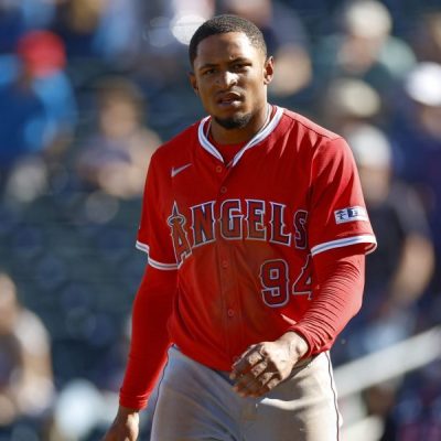 GOODYEAR, ARIZONA - MARCH 4: Christian Moore #94 of the Los Angeles Angels walks on the field in the seventh inning during a spring training game against the Cleveland Guardians at Goodyear Ballpark on March 4, 2025 in Goodyear, Arizona. (Photo by Brandon Sloter/Getty Images)