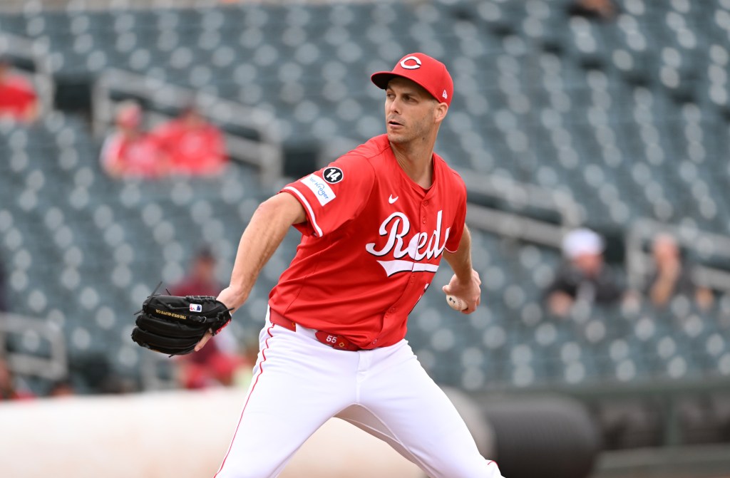Taylor Rogers #55 of the Cincinnati Reds delivers a pitch against the Athletics during a spring training game at Goodyear Ballpark on March 13, 2025 in Goodyear, Arizona. (Photo by Norm Hall/Getty Images)