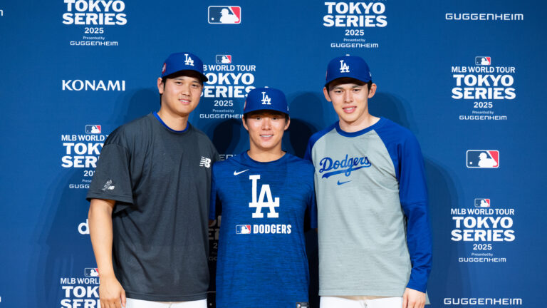 Shohei Ohtani, Yoshinobu Yamamoto and Roki Sasaki of the Los Angeles Dodgers pose during a press conference ahead of the MLB Tokyo Series at Tokyo Dome.
