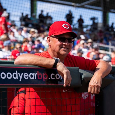 GOODYEAR, ARIZONA - FEBRUARY 24: Manager Terry Francona #77 of the Cincinnati Reds smiles before a game against the Los Angeles Dodgers at Goodyear Ballpark on February 24, 2025 in Goodyear, Arizona. (Photo by Kate Woolson/Cincinnati Reds/Getty Images)