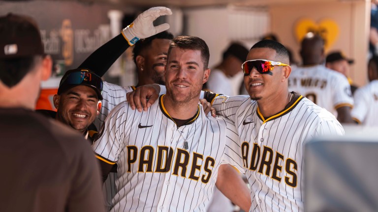 SAN DIEGO, CALIFORNIA - MARCH 27: Gavin Sheets #30 of the San Diego Padres celebrates after hitting a home run in the seventh inning during the game against the Atlanta braves on opening day at Petco Park on March 27, 2025 in San Diego, California. (Photo by Matt Thomas/San Diego Padres/Getty Images)