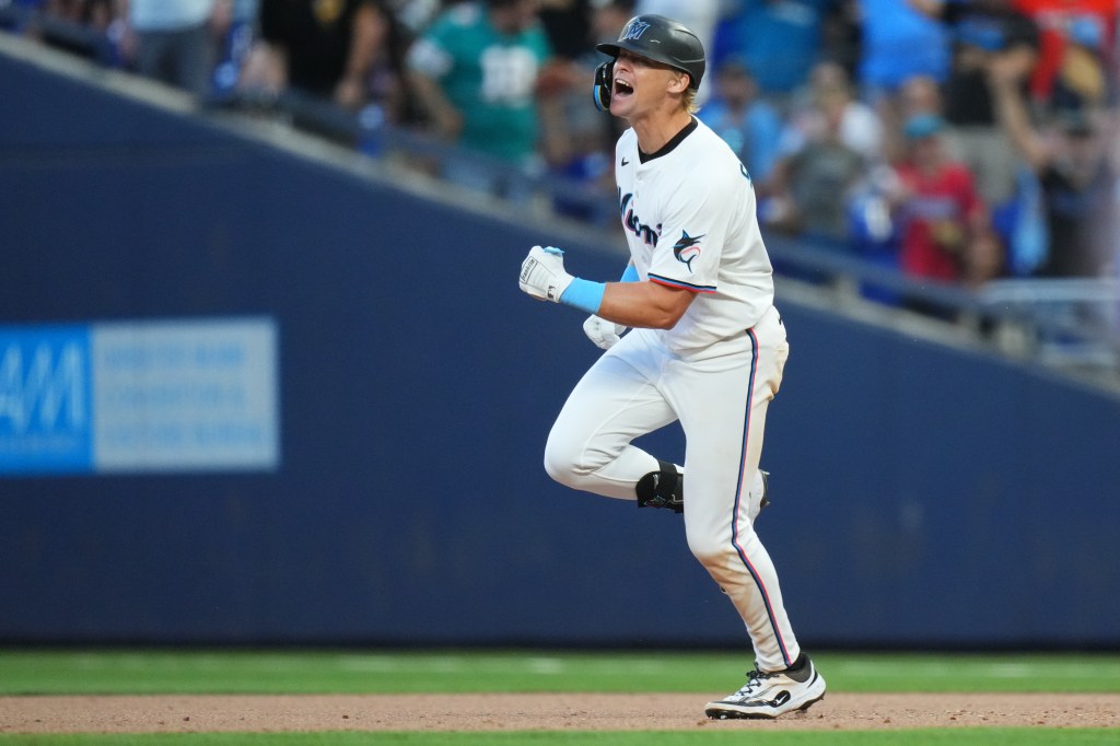 MIAMI, FLORIDA - MARCH 27: Kyle Stowers #28 of the Miami Marlins reacts after hitting a walk off single to defeat Pittsburgh Pirates on their Opening Day game at loanDepot park on March 27, 2025 in Miami, Florida. (Photo by Rich Storry/Getty Images)