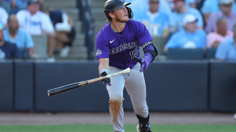 TAMPA, FL - MARCH 28: Hunter Goodman #15 of the Colorado Rockies hits a double during the game between the Colorado Rockies and the Tampa Bay Rays at George M. Steinbrenner Field on Friday, March 28, 2025 in Tampa, Florida. (Photo by Mike Carlson/MLB Photos via Getty Images)