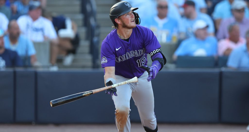 TAMPA, FL - MARCH 28: Hunter Goodman #15 of the Colorado Rockies hits a double during the game between the Colorado Rockies and the Tampa Bay Rays at George M. Steinbrenner Field on Friday, March 28, 2025 in Tampa, Florida. (Photo by Mike Carlson/MLB Photos via Getty Images)