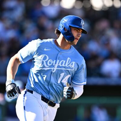SURPRISE, ARIZONA - FEBRUARY 21, 2025: Jac Caglianone #14 of the Kansas City Royals runs out a fly ball during the eighth inning of a spring training game against the Texas Rangers at Surprise Stadium on February 21, 2025 in Surprise, Arizona. (Photo by Chris Bernacchi/Diamond Images via Getty Images)