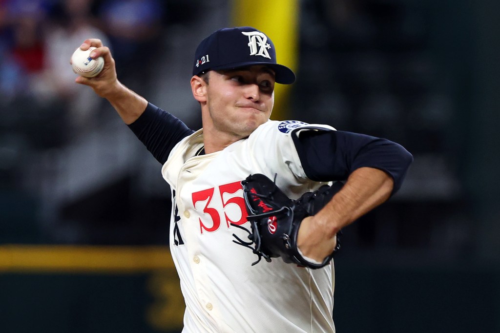 Jack Leiter of the Texas Rangers pitches in the first inning against the Boston Red Sox at Globe Life Field.