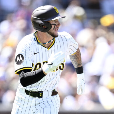Jackson Merrill of the San Diego Padres hits a single in the first inning against the Atlanta Braves on Opening Day at Petco Park.