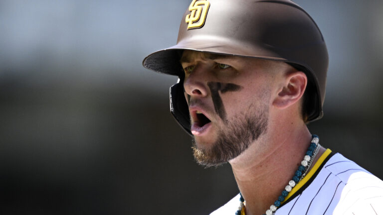 Jackson Merrill #3 of the San Diego Padres reacts after a single against the Atlanta Braves on Opening Day at Petco Park.