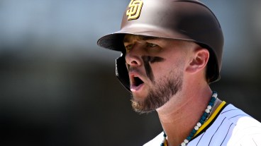 Jackson Merrill #3 of the San Diego Padres reacts after a single against the Atlanta Braves on Opening Day at Petco Park.