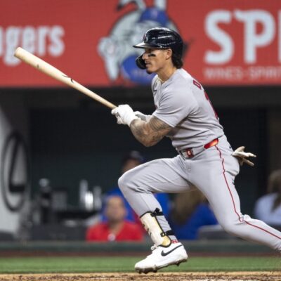 ARLINGTON, TEXAS - MARCH 27: Jarren Duran #16 of the Boston Red Sox hits a single during the eighth inning of the Opening Day game against the Texas Rangers on March 27, 2025 at Globe Life Field in Arlington, Texas. (Photo by Maddie Malhotra/Boston Red Sox/Getty Images)