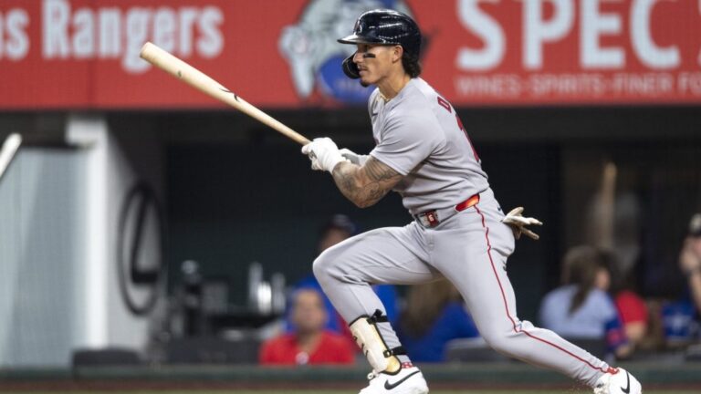 ARLINGTON, TEXAS - MARCH 27: Jarren Duran #16 of the Boston Red Sox hits a single during the eighth inning of the Opening Day game against the Texas Rangers on March 27, 2025 at Globe Life Field in Arlington, Texas. (Photo by Maddie Malhotra/Boston Red Sox/Getty Images)