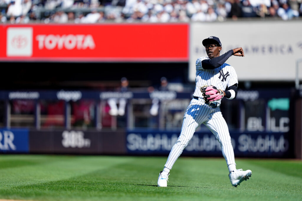 NEW YORK, NY - MARCH 27: Jazz Chisholm Jr. #13 of the New York Yankees throws to first base for the out during the game between the Milwaukee Brewers and the New York Yankees at Yankee Stadium on Thursday, March 27, 2025 in New York, New York. (Photo by Mary DeCicco/MLB Photos via Getty Images)