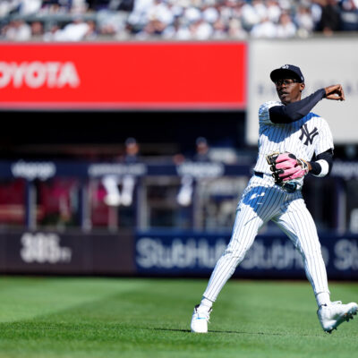 NEW YORK, NY - MARCH 27: Jazz Chisholm Jr. #13 of the New York Yankees throws to first base for the out during the game between the Milwaukee Brewers and the New York Yankees at Yankee Stadium on Thursday, March 27, 2025 in New York, New York. (Photo by Mary DeCicco/MLB Photos via Getty Images)