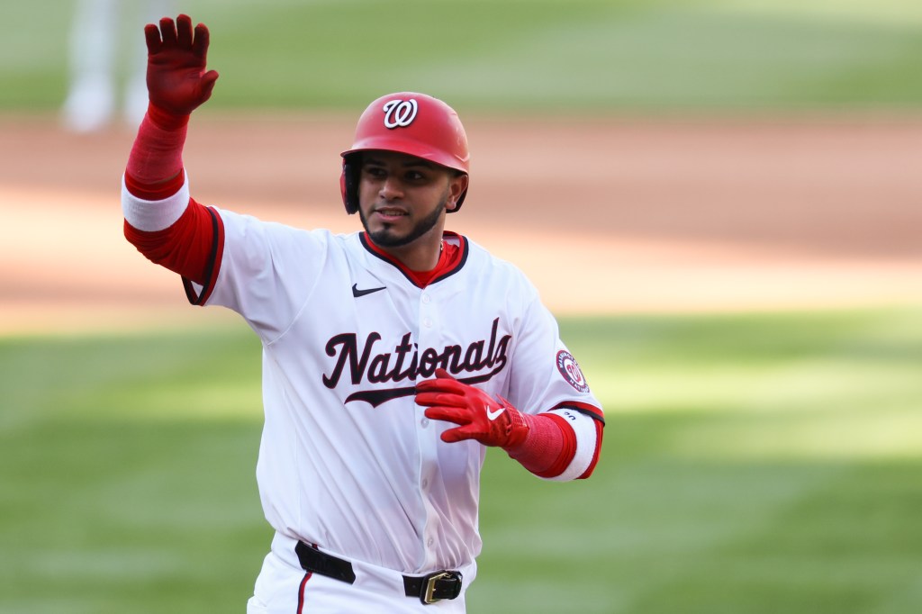WASHINGTON, DC - MARCH 27: Keibert Ruiz #20 of the Washington Nationals reacts after hitting a solo home run in the fifth inning during the game between the Philadelphia Phillies and the Washington Nationals at Nationals Park on Thursday, March 27, 2025 in Washington, District of Columbia. (Photo by Rob Tringali/MLB Photos via Getty Images)