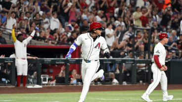 PHOENIX, ARIZONA - MARCH 27: Ketel Marte #4 of the Arizona Diamondbacks scores a run in the first inning against the Chicago Cubs on Opening Day at Chase Field on March 27, 2025 in Phoenix, Arizona. (Photo by Norm Hall/Getty Images)