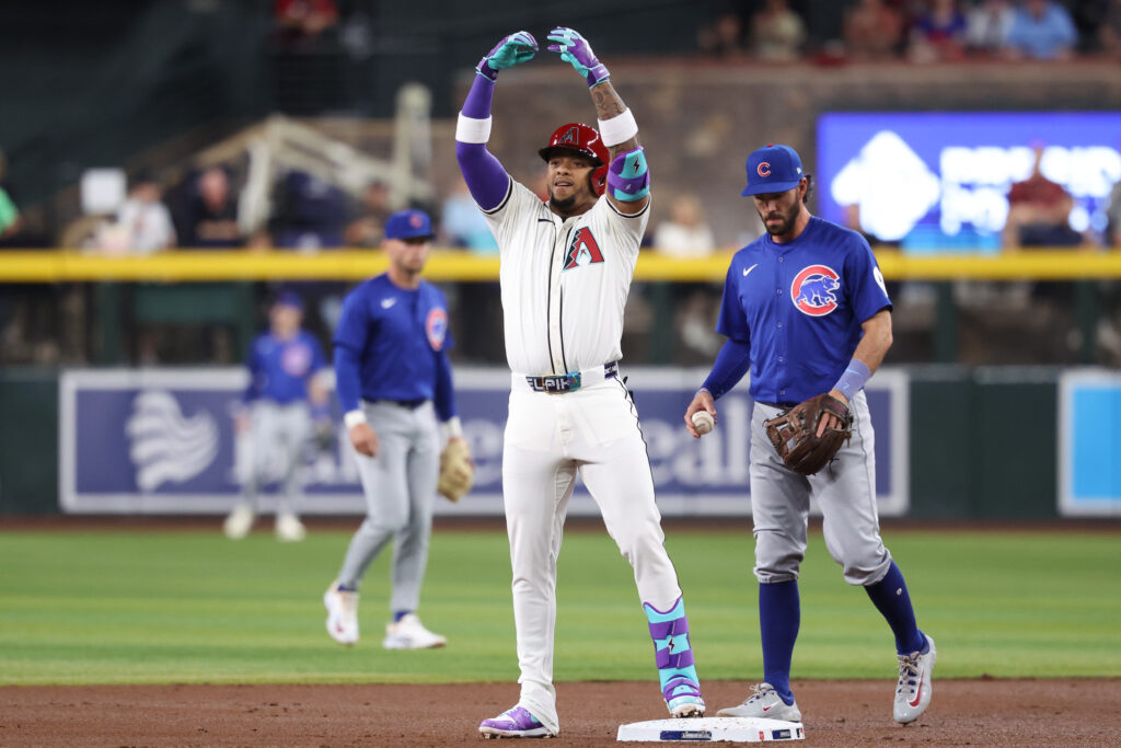 PHOENIX, AZ - MARCH 27: Ketel Marte #4 of the Arizona Diamondbacks celebrates on second base after doubling in the first inning during the game between the Chicago Cubs and the Arizona Diamondbacks at Chase Field on Thursday, March 27, 2025 in Phoenix, Arizona. (Photo by Chris Coduto/MLB Photos via Getty Images)