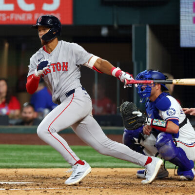 ARLINGTON, TEXAS - MARCH 27: Kristian Campbell #28 of the Boston Red Sox hits a single in the ninth against the Texas Rangers in an Opening Day game at Globe Life Field on March 27, 2025 in Arlington, Texas. (Photo by Richard Rodriguez/Getty Images)