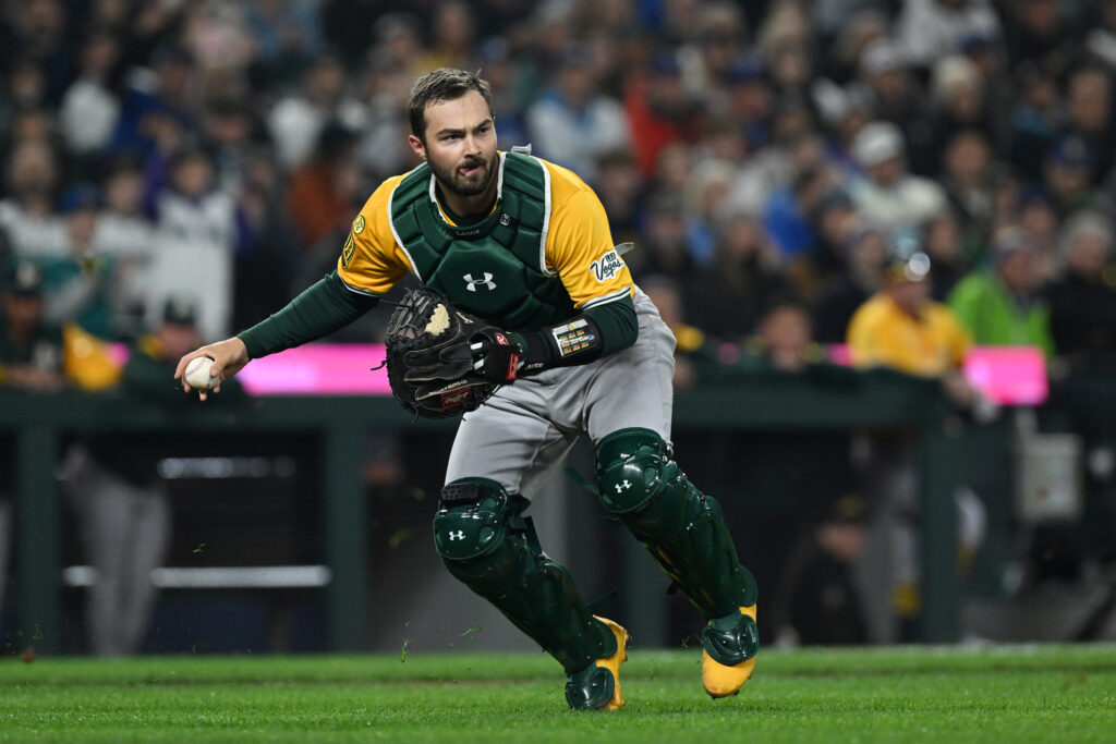 SEATTLE, WA - MARCH 27: Shea Langeliers #23 of the Athletics throws during the game between the Athletics and the Seattle Mariners at T-Mobile Park on Thursday, March 27, 2025 in Seattle, Washington. (Photo by Rod Mar/MLB Photos via Getty Images)