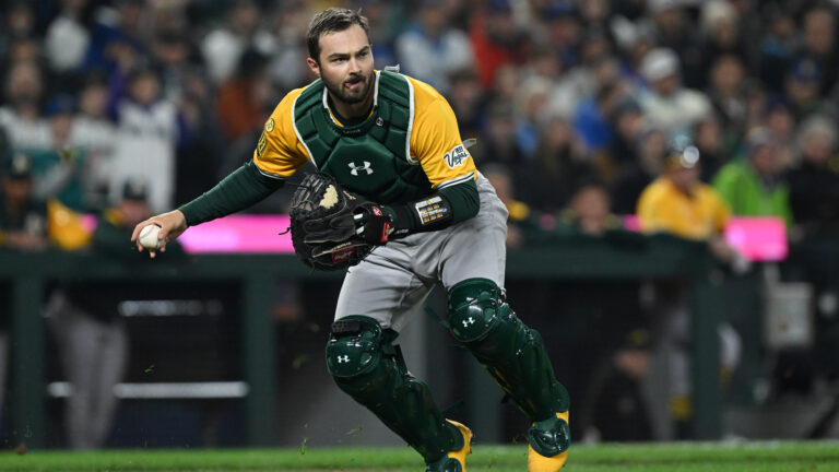 SEATTLE, WA - MARCH 27: Shea Langeliers #23 of the Athletics throws during the game between the Athletics and the Seattle Mariners at T-Mobile Park on Thursday, March 27, 2025 in Seattle, Washington. (Photo by Rod Mar/MLB Photos via Getty Images)