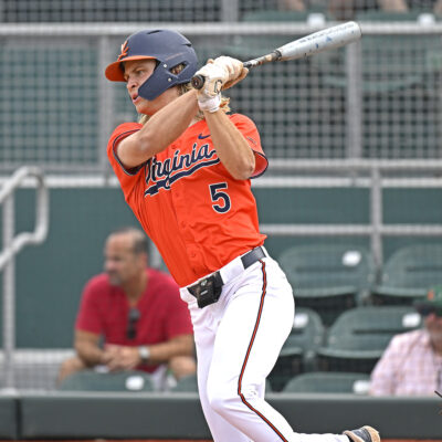 Virginia infielder Luke Hanson hits an RBI single in the fifth inning as the Miami Hurricanes faced the Virginia Cavaliers.
