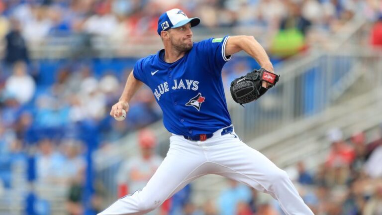 Toronto Blue Jays pitcher Max Scherzer delivers a pitch to the plate during the spring training game between the St. Louis Cardinals and the Toronto Blue Jays at the TD Ballpark.
