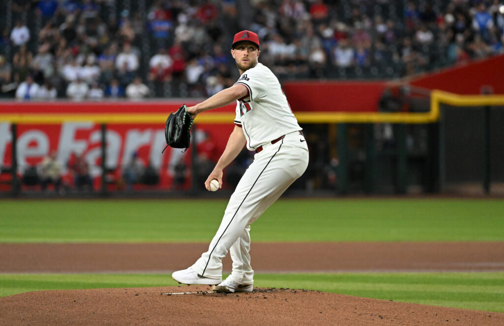 PHOENIX, ARIZONA - MARCH 28: Merrill Kelly #29 of the Arizona Diamondbacks delivers a first inning pitchagainst the Chicago Cubs at Chase Field on March 28, 2025 in Phoenix, Arizona. (Photo by Norm Hall/Getty Images)