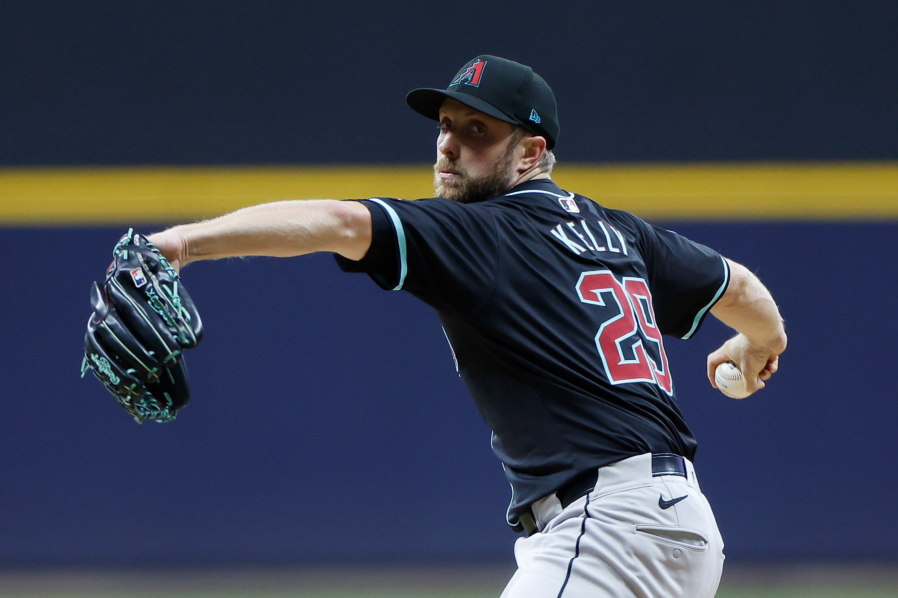 Merrill Kelly of the Arizona Diamondbacks throws a pitch in the first inning against the Milwaukee Brewers at American Family Field.