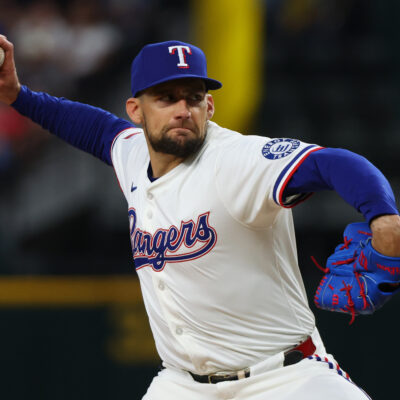 Nathan Eovaldi of the Texas Rangers throws a pitch during a game against the Boston Red Sox on Opening Day at Globe Life Field.