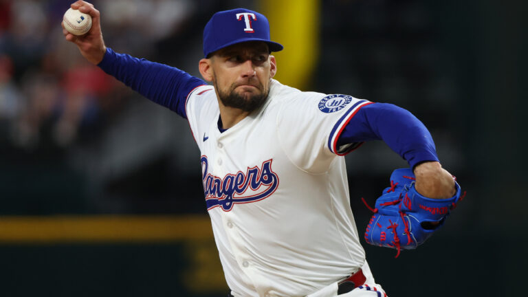 Nathan Eovaldi of the Texas Rangers throws a pitch during a game against the Boston Red Sox on Opening Day at Globe Life Field.