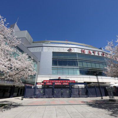 WASHINGTON, DC - MARCH 27: A general view of an entrance to the stadium with Cherry Blossom trees prior to the game between the Philadelphia Phillies and the Washington Nationals at Nationals Park on Thursday, March 27, 2025 in Washington, District of Columbia. (Photo by Rob Tringali/MLB Photos via Getty Images)