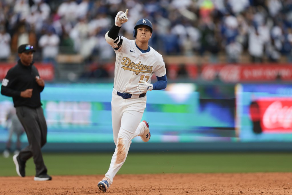 LOS ANGELES, CA - MARCH 27: Shohei Ohtani #17 of the Los Angeles Dodgers rounds the bases after hitting a solo home run in the seventh inning during the game between the Detroit Tigers and the Los Angeles Dodgers at Dodger Stadium on Thursday, March 27, 2025 in Los Angeles, California. (Photo by Katelyn Mulcahy/MLB Photos via Getty Images)