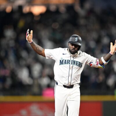 SEATTLE, WA - MARCH 27: Randy Arozarena #56 of the Seattle Mariners reacts after hitting a two-run home run in the top of the eighth inning during the game between the Athletics and the Seattle Mariners at T-Mobile Park on Thursday, March 27, 2025 in Seattle, Washington. (Photo by Rod Mar/MLB Photos via Getty Images)