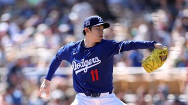 Roki Sasaki of the Los Angeles Dodgers pitches against the Cleveland Guardians during the first inning at Camelback Ranch.
