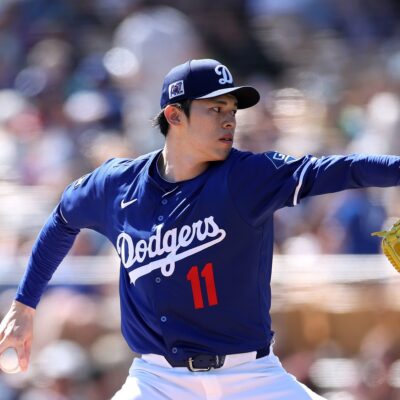 Roki Sasaki of the Los Angeles Dodgers pitches against the Cleveland Guardians during the first inning at Camelback Ranch.