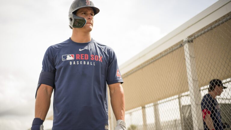 Roman Anthony #48 of the Boston Red Sox looks on during a Spring Training workout at JetBlue Park at Fenway South.