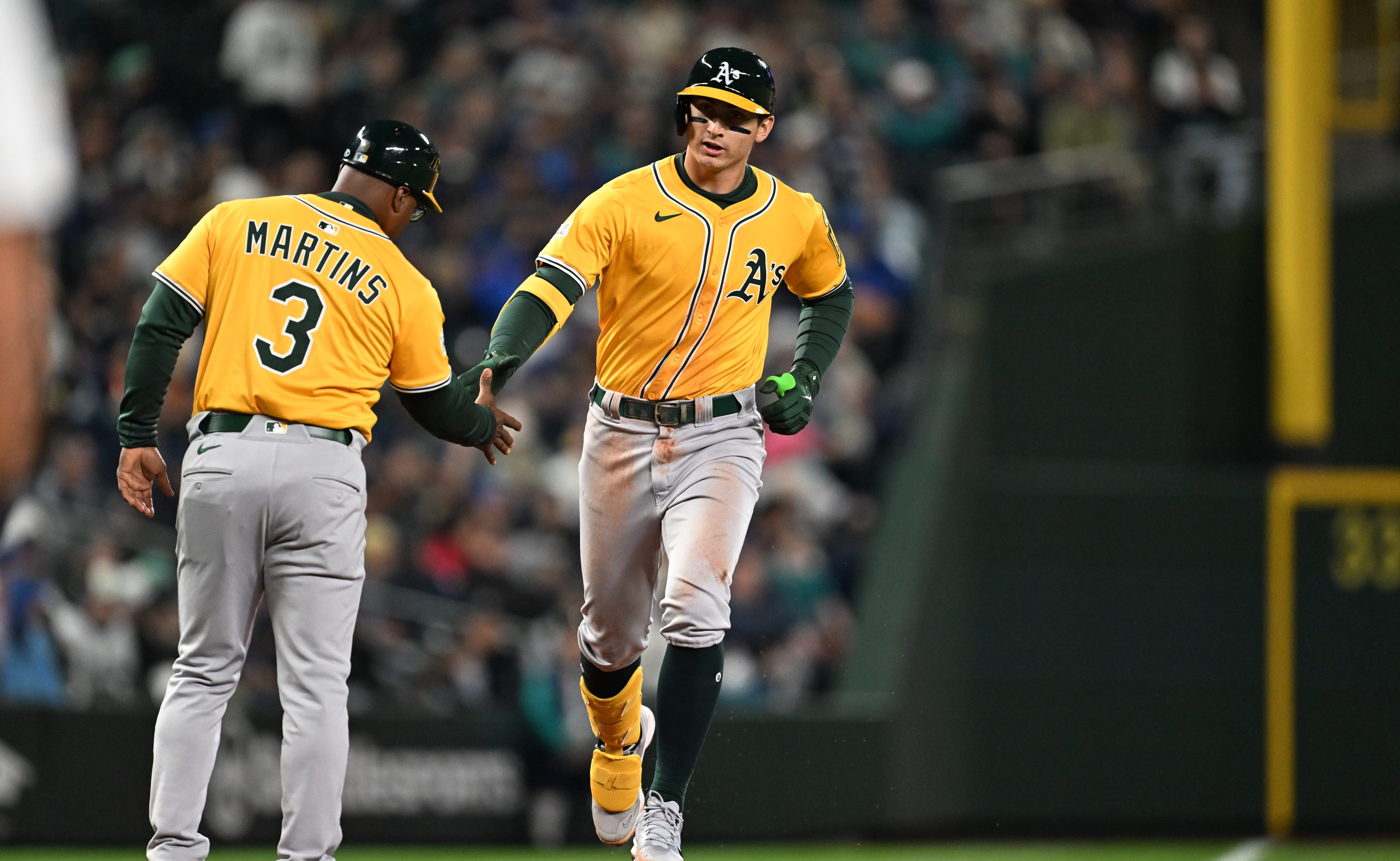 Tyler Soderstrom of the Athletics rounds the bases after hitting a home run in the bottom of the fourth inning during the game between the Athletics and the Seattle Mariners at T-Mobile Park.