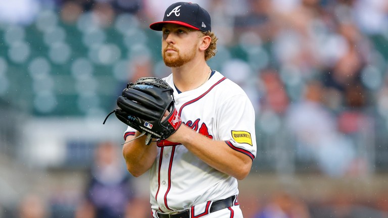 Spencer Schwellenbach of the Atlanta Braves reacts during the game between the New York Mets and the Atlanta Braves at Truist Park.
