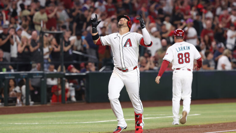 PHOENIX, AZ - MARCH 27: Eugenio Suárez #28 of the Arizona Diamondbacks celebrates as he rounds the bases after hitting a solo home run in the second inning during the game between the Chicago Cubs and the Arizona Diamondbacks at Chase Field on Thursday, March 27, 2025 in Phoenix, Arizona. (Photo by Chris Coduto/MLB Photos via Getty Images)