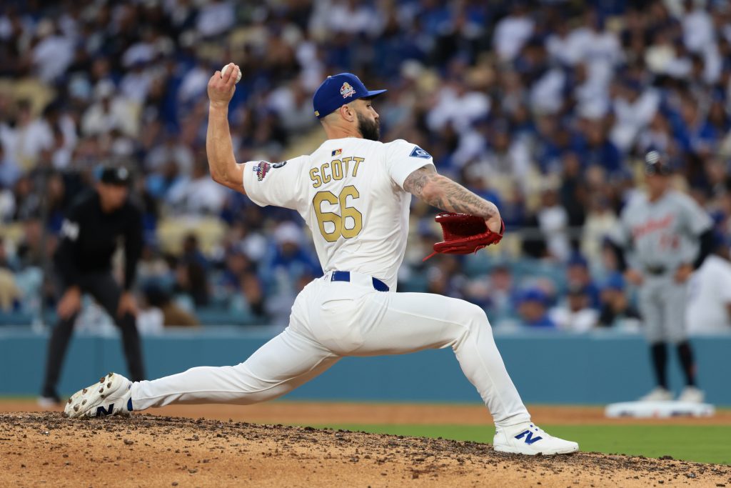LOS ANGELES, CA - MARCH 27:   Tanner Scott #66 of the Los Angeles Dodgers pitches during the game between the Detroit Tigers and the Los Angeles Dodgers at Dodger Stadium on Thursday, March 27, 2025 in Los Angeles, California. (Photo by Katelyn Mulcahy/MLB Photos via Getty Images)